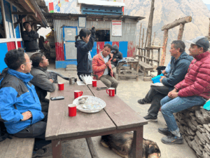 Meeting with Mr. Phe Dorji (Center Orange Jacket)